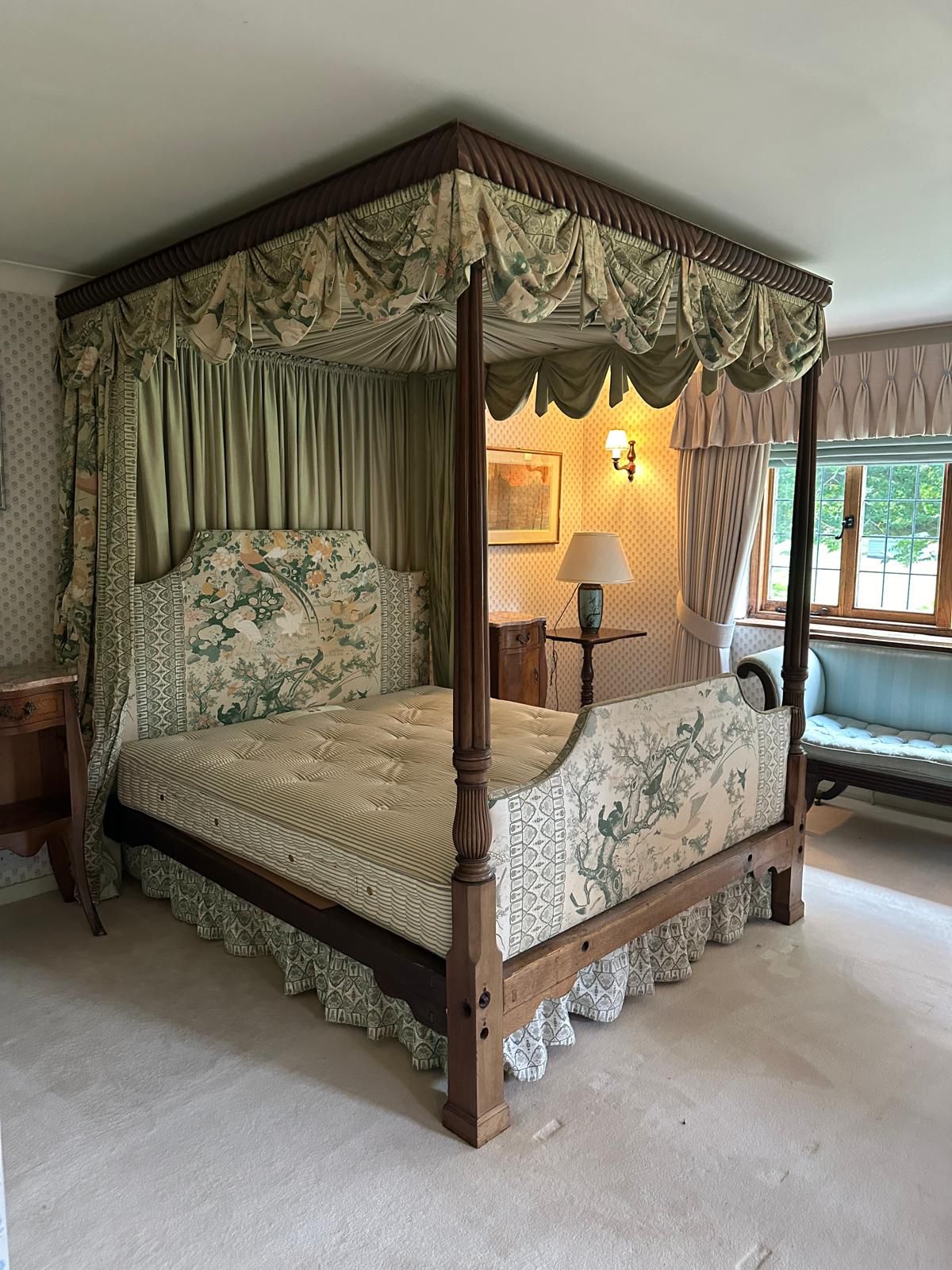 A George III style mahogany four poster bedstead